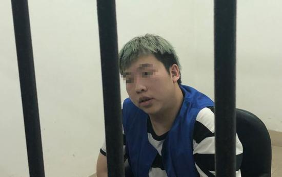 犯罪嫌疑人李某。澎湃新聞?dòng)浾?楊帆 攝